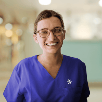 Smiling staff member in a healthcare setting