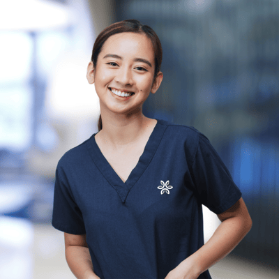 Smiling female staff member in a healthcare setting