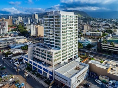 Aerial view of Kalākaua Gardens building in urban setting