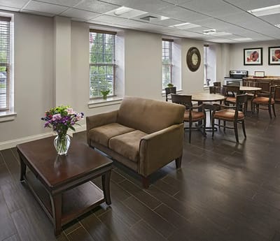 Common area with seating and dining tables