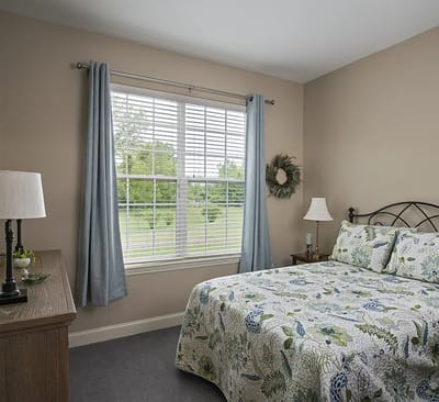 Cozy private room with a bed and natural light