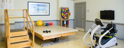 Rehabilitation therapy room with exercise equipment