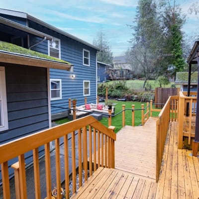 Wooden pathways leading to outdoor seating area