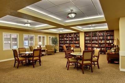 Cozy common area with bookshelves and seating