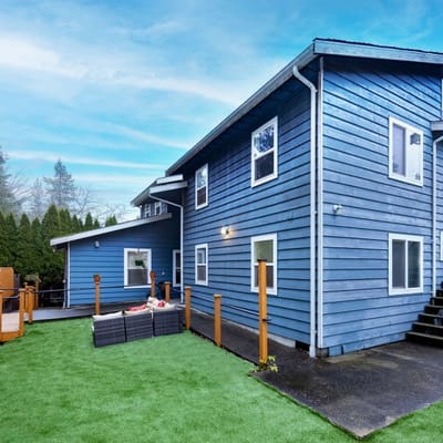 Exterior view of a blue assisted living facility