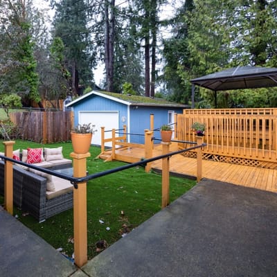 Outdoor seating area with gazebo and garden space