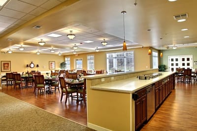 Bright dining room with tables and chairs