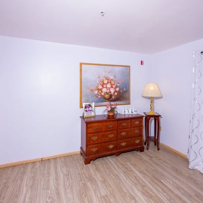 Cozy interior of a resident's room with floral decor