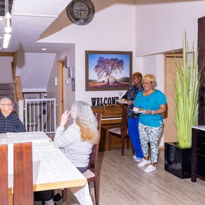 Residents and staff interacting in a common area