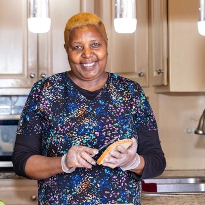 Staff member preparing food in the kitchen