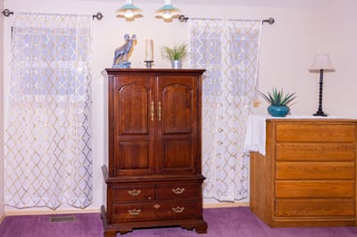 Cozy interior view of a resident room with furniture