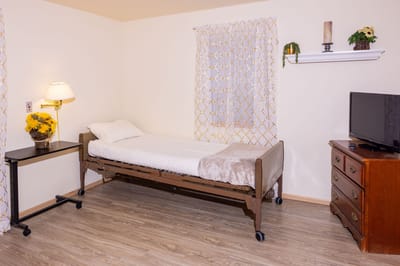 Cozy resident room with a bed and decor