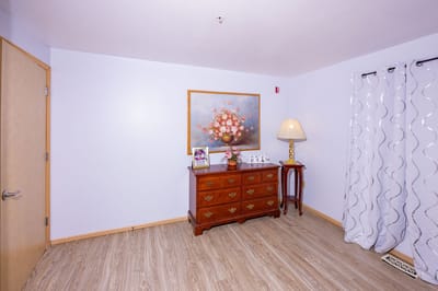 Cozy interior view of a resident room with furniture