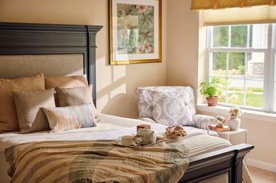 Cozy senior living room with natural light and food