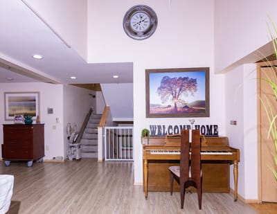 Bright interior of a common area with piano