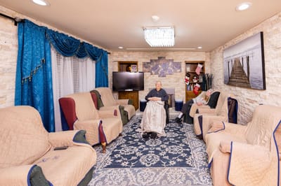 Residents relaxing in a cozy common room
