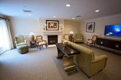 Cozy common area with seating and a fireplace