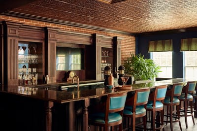 Interior bar with wooden furnishings and seating