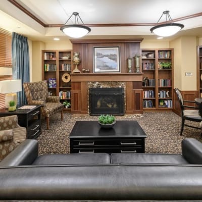 Cozy common area with seating and a fireplace