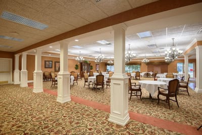 Bright dining area with tables and chairs