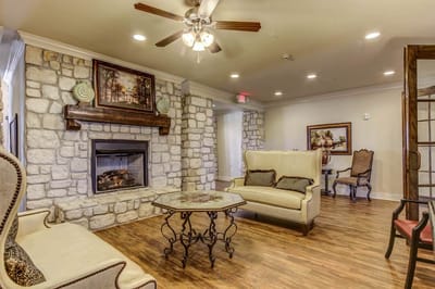 Interior lounge area with cozy seating and fireplace