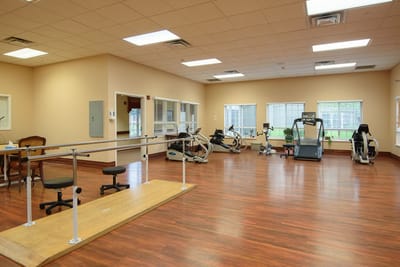 Rehabilitation gym with exercise equipment and equipment