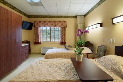 Interior view of a shared resident room with two beds