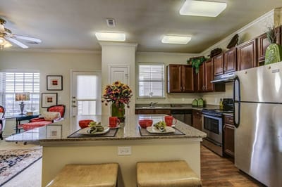 Interior view of a well-equipped kitchen in a senior living facility