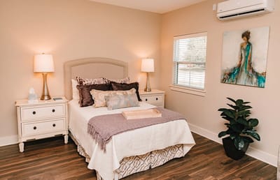 Cozy private resident room with decor and lighting