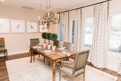 Elegant dining room setup with table and decor
