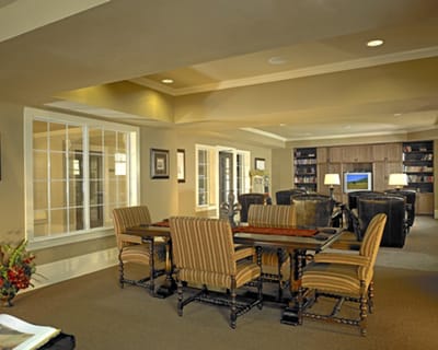 Common area with seating and bookshelves