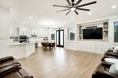 Bright common area with modern furnishings and large windows