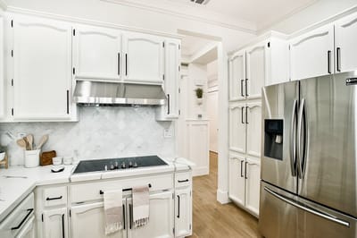 Bright, modern kitchen space with stainless steel appliances