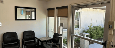 Seating area with chairs and outdoor view