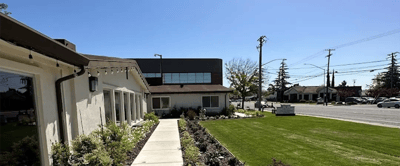 Exterior view of the facility with landscaping.