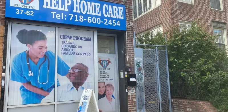 Exterior view of Help Home Care facility with signage.