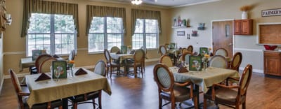 Dining room with tables set for guests