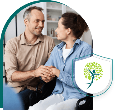 Logo with two people and tree graphic