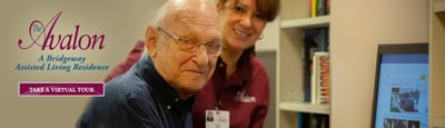 A resident and staff member engaging in a personal interaction