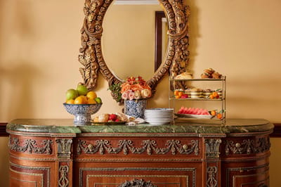 Brandywine The Savoy, assisted living in Queens, NY — Elegant buffet table with fruits, pastries, and flowers