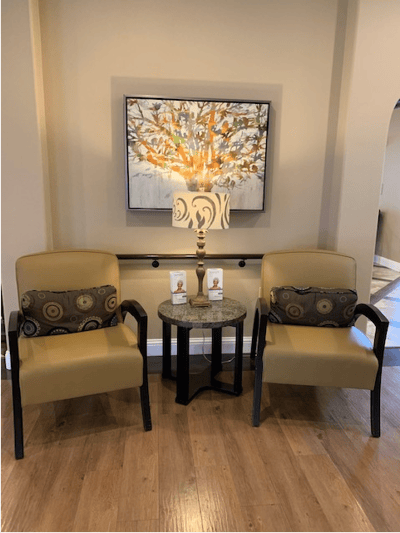 Cozy seating area with artwork in common space