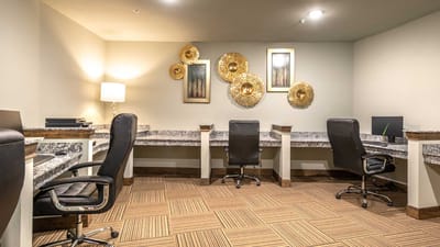 Interior workspace with desks and chairs