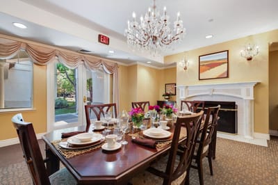 Elegant dining room setup with floral centerpieces