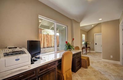 Interior view of a common area with desk and chairs