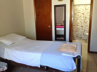 Private resident room with a bed and bathroom access