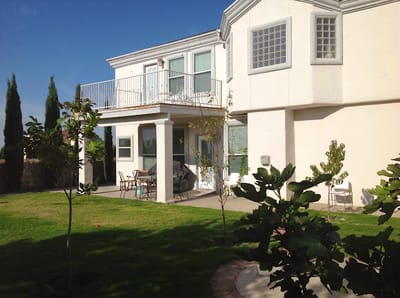 Exterior view of a residential facility with landscaping