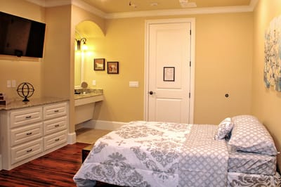 Private resident room with bed and furnishings