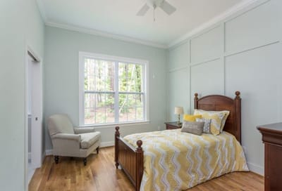 Private room with a bed and natural light