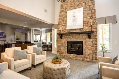 Cozy common area with a fireplace and seating