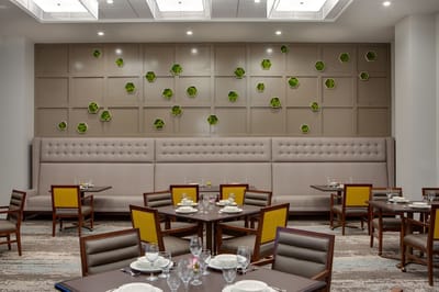 Elegant dining room setup with tables and decor